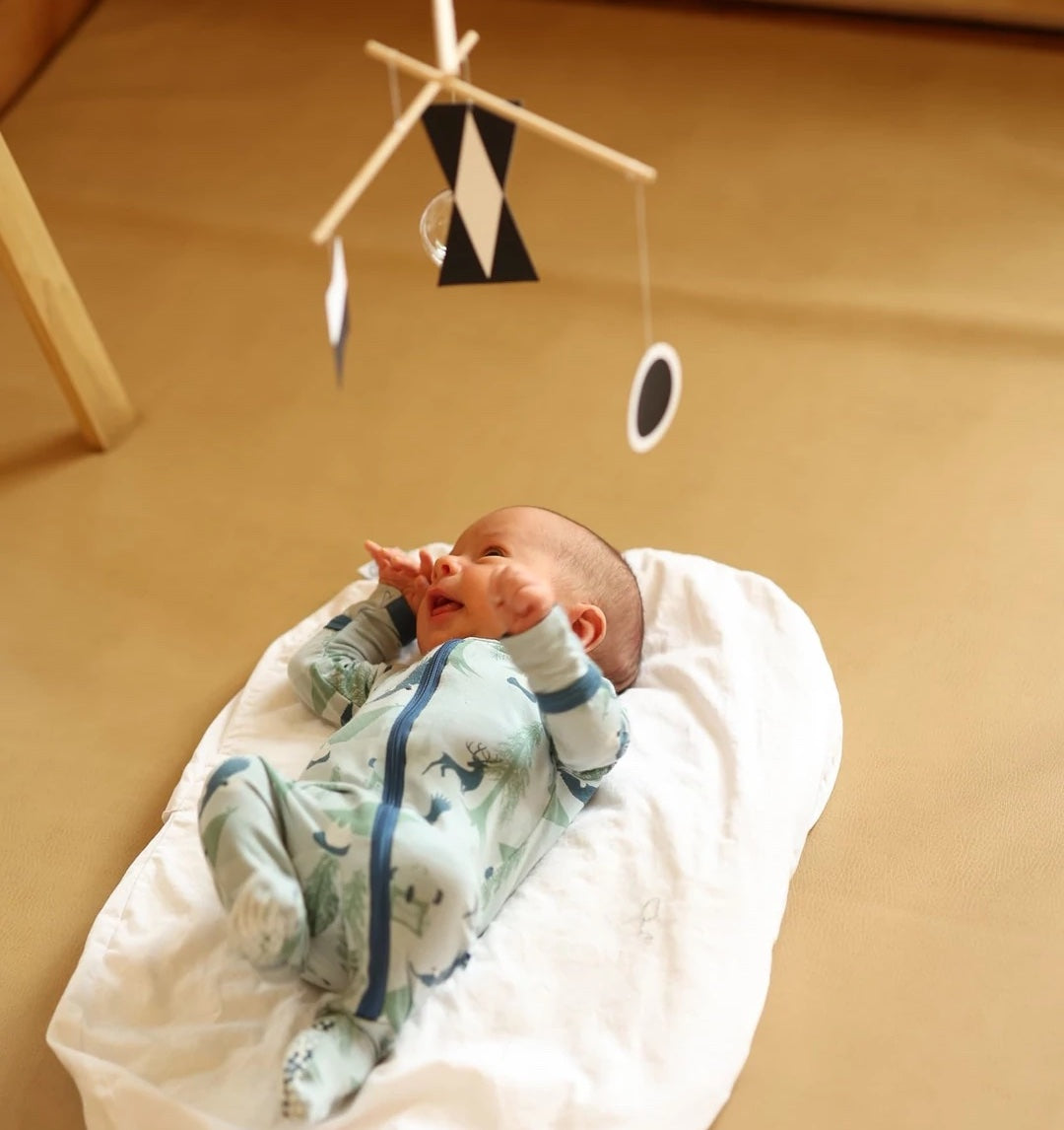 4 Ways to Help Your Child Better Enjoy Their Montessori Mobiles